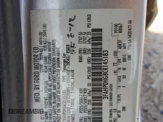 2012 Ford Fusion SE z VIN 3FAHP0HG8CR145183, wystawiony jako Copart lot #58627705 z przebiegiem 236 148 mil mil oraz Szkoda całkowita • Salvage title. Historia ofert i sprzedaży dostępna na DreamBid. Obrazek 13.