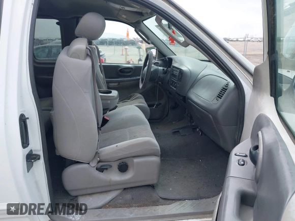 2003 Ford F-150 XL with VIN 1FTRX18L73NB72735, listed as a IAAI auction lot 42016567 with 0 mi miles. Bid and sale history available at carsss.com. Image 5.