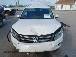 2013 Volkswagen Tiguan SE with VIN WVGAV7AX5DW545202, listed as a IAAI auction lot 42318584 with 91,556 mi miles and . Bid and sale history available at DreamBid. Image 6.