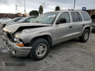 2000 Dodge Durango z VIN 1B4HR28Y4YF259871, wystawiony jako Copart lot #79880224 z przebiegiem 216 101 mil mil oraz Szkoda całkowita • Salvage title. Historia ofert i sprzedaży dostępna na DreamBid. Obrazek 1.