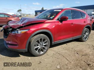 2021 Mazda CX-5 Signature with VIN JM3KFBEYXM0434778, listed as a Copart auction lot 51980255 with 34,283 mi miles and Salvage Title. Bid and sale history available at carsss.com. Image 1.