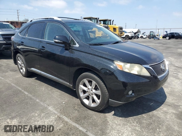 2010 Lexus RX 350 with VIN JTJZK1BA1A2407924, listed as a Copart auction lot 60111855 with 157,055 mi miles and Salvage title. Bid and sale history available at DreamBid. Image 4.