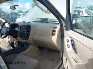 2005 Ford Escape XLS Value with VIN 1FMYU02Z45KB85048, listed as a IAAI auction lot 42309081 with 106,395 mi miles and . Bid and sale history available at DreamBid. Image 8.