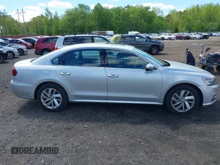 2018 Volkswagen Passat SE z VIN 1VWBA7A38JC004818, wystawiony jako IAAI lot #42205205 z przebiegiem 105 559 mil mil oraz . Historia ofert i sprzedaży dostępna na DreamBid. Obrazek 14.