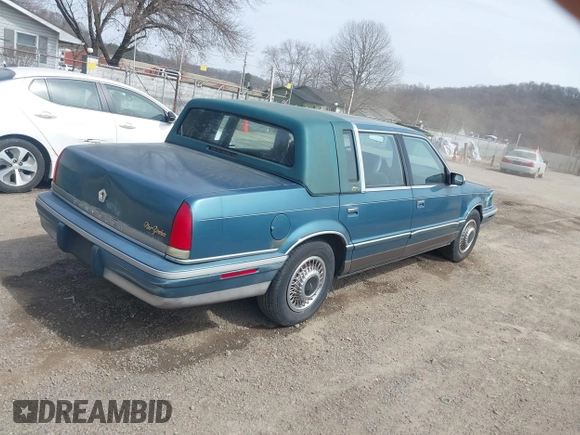 1993 Chrysler New Yorker z VIN 1C3XV66R5PD188692, wystawiony jako IAAI lot #41832600 z przebiegiem 146 380 mil mil oraz . Historia ofert i sprzedaży dostępna na DreamBid. Obrazek 4.