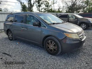 2011 Honda Odyssey EX-L with VIN 5FNRL5H65BB015246, listed as a Copart auction lot 53928745 with 211,941 mi miles and Clean Title. Bid and sale history available at carsss.com. Image 4.