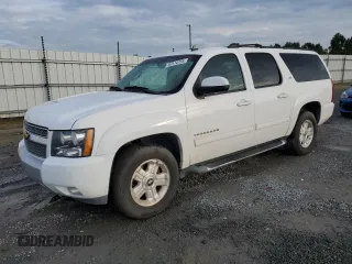 2013 Chevrolet Suburban LT with VIN 1GNSCJE06DR203594, listed as a Copart auction lot 63114724 with 263,456 mi miles and Salvage Title. Bid and sale history available at carsss.com. Image 1.