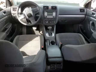2009 Volkswagen Jetta S with VIN 3VWJZ71K99M059879, listed as a Copart auction lot 47478145 with 154,359 mi miles and Salvage title. Bid and sale history available at DreamBid. Image 8.