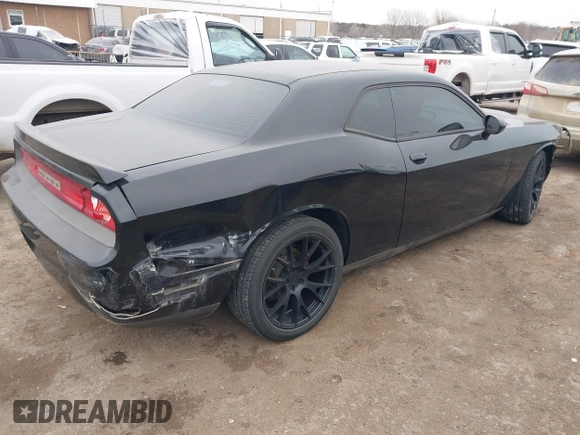 2013 Dodge Challenger SXT z VIN 2C3CDYAGXDH718768, wystawiony jako IAAI lot #41339735 z przebiegiem 187 052 mil mil oraz . Historia ofert i sprzedaży dostępna na DreamBid. Obrazek 4.