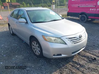 2009 Toyota Camry LE z VIN 4T1BK46K59U581564, wystawiony jako IAAI lot #42277516 z przebiegiem 135 498 mil mil oraz . Historia ofert i sprzedaży dostępna na DreamBid. Obrazek 1.