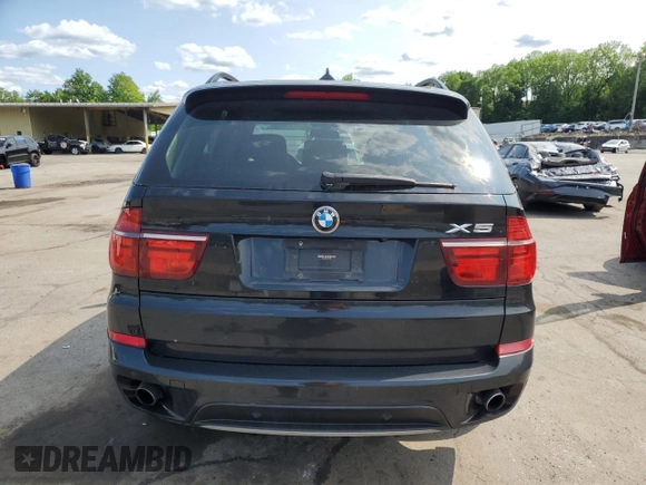 2012 BMW X5 35i with VIN 5UXZV4C59CL752661, listed as a Copart auction lot 58590305 with 101,725 mi miles and Salvage title. Bid and sale history available at DreamBid. Image 6.