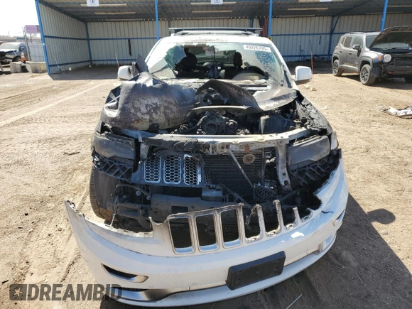 2015 Jeep Grand Cherokee Summit с VIN 1C4RJFJT5FC796820, выставлен на аукционе Copart как лот 49226795 с пробегом Не указан миль и Списание • Salvage title. История ставок и продаж доступна на DreamBid. Изображение 5.