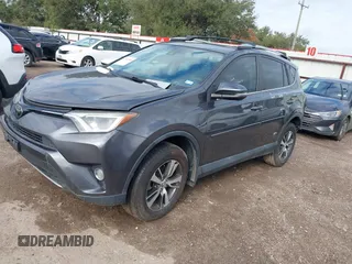 2018 Toyota RAV4 XLE with VIN 2T3WFREV4JW417555, listed as a IAAI auction lot 41092589 with 93,788 mi miles and . Bid and sale history available at DreamBid. Image 18.