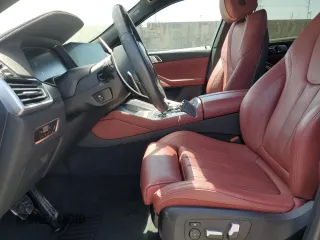 2022 BMW X6 xDrive40i z VIN 5UXCY6C01N9M95573, wystawiony jako Copart lot #54049805 z przebiegiem 24 031 mil mil oraz Szkoda całkowita • Salvage title. Historia ofert i sprzedaży dostępna na DreamBid. Obrazek 7.