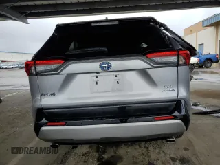 2023 Toyota RAV4 Hybrid XSE z VIN 4T3E6RFV2PU122716, wystawiony jako Copart lot #51009615 z przebiegiem 28 643 mil mil oraz Nie do naprawy • Non repairable. Historia ofert i sprzedaży dostępna na DreamBid. Obrazek 6.