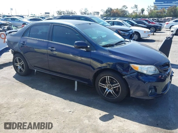2012 Toyota Corolla L with VIN 2T1BU4EE3CC779137, listed as a IAAI auction lot 42008243 with 123,760 mi miles. Bid and sale history available at carsss.com. Image 1.