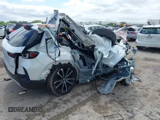 2023 Mazda CX-50 Premium z VIN 7MMVABDY7PN138825, wystawiony jako IAAI lot #42214751 z przebiegiem Nie podano mil oraz . Historia ofert i sprzedaży dostępna na DreamBid. Obrazek 4.