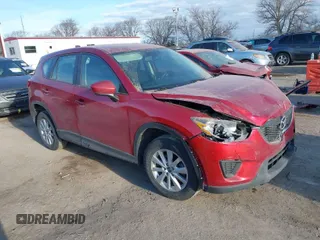 2014 Mazda CX-5 Sport with VIN JM3KE4BE6E0370104, listed as a IAAI auction lot 41879275 with 183,882 mi miles. Bid and sale history available at carsss.com. Image 1.