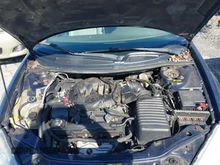 2006 Chrysler Sebring with VIN 1C3EL66R06N101402, listed as a IAAI auction lot 41563520 with 182,128 mi miles and . Bid and sale history available at DreamBid. Image 10.