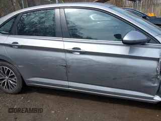 2021 Volkswagen Jetta S z VIN 3VWC57BUXMM048600, wystawiony jako IAAI lot #41956222 z przebiegiem 59 870 mil mil oraz . Historia ofert i sprzedaży dostępna na DreamBid. Obrazek 17.