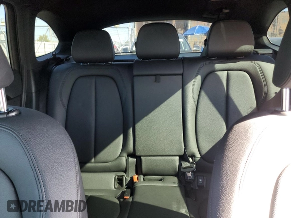 2018 BMW X1 xDrive28i with VIN WBXHT3C34J5K26230, listed as a Copart auction lot 50069465 with 89,520 mi miles and Salvage Title. Bid and sale history available at carsss.com. Image 10.