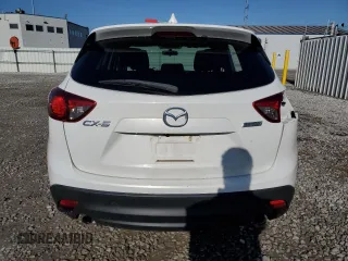 2014 Mazda CX-5 Touring with VIN JM3KE2CY8E0350661, listed as a Copart auction lot 51739805 with 219,351 mi miles and Salvage Title. Bid and sale history available at carsss.com. Image 6.