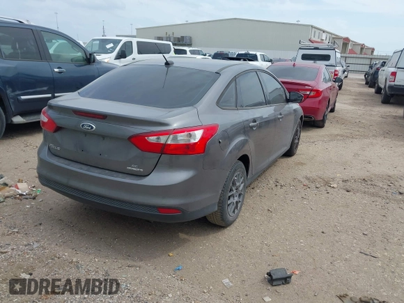 2013 Ford Focus SE z VIN 1FADP3F23DL159239, wystawiony jako IAAI lot #42076471 z przebiegiem 111 346 mil mil oraz . Historia ofert i sprzedaży dostępna na DreamBid. Obrazek 4.