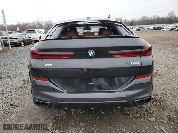 2025 BMW X6 M60i with VIN 5UX43EX02S9W76491, listed as a Copart auction lot 85033264 with 5,173 mi miles and Salvage Title. Bid and sale history available at carsss.com. Image 6.