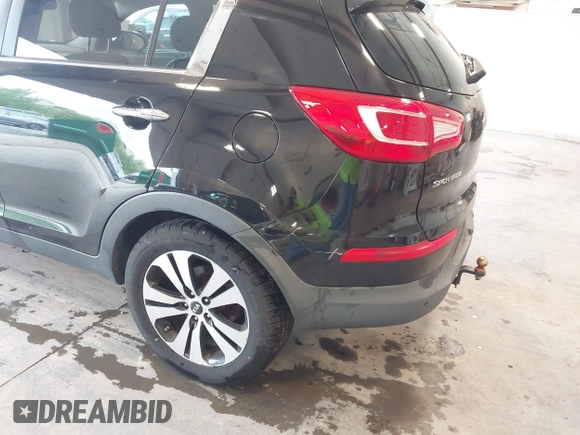 2012 Kia Sportage EX with VIN KNDPCCA2XC7311504, listed as a IAAI auction lot 42330710 with 170,638 mi miles and . Bid and sale history available at DreamBid. Image 6.