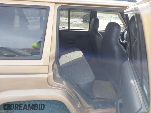 1999 Jeep Cherokee Sport with VIN 1J4FF68S1XL540249, listed as a IAAI auction lot 41660594 with 133,995 mi miles and . Bid and sale history available at DreamBid. Image 8.