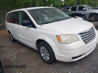 2009 Chrysler Town & Country LX with VIN 2A8HR44E39R606779, listed as a IAAI auction lot 42059256 with 177,228 mi miles and . Bid and sale history available at DreamBid. Image 1.