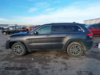 2019 Jeep Grand Cherokee Altitude with VIN 1C4RJEAG2KC698822, listed as a IAAI auction lot 41476562 with 128,035 mi miles and . Bid and sale history available at DreamBid. Image 14.