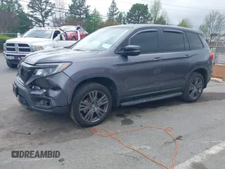 2020 Honda Passport EX-L z VIN 5FNYF8H5XLB018060, wystawiony jako IAAI lot #41961243 z przebiegiem 60 575 mil mil oraz . Historia ofert i sprzedaży dostępna na DreamBid. Obrazek 17.