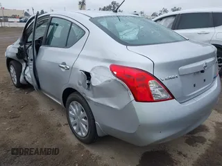 2012 Nissan Versa SL with VIN 3N1CN7AP6CL897158, listed as a IAAI auction lot 41729588 with 98,534 mi miles. Bid and sale history available at carsss.com. Image 3.