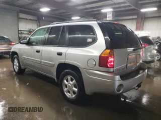 2004 GMC Envoy SLE with VIN 1GKDS13S742369547, listed as a Copart auction lot 51507445 with 119,824 mi miles and Salvage Title. Bid and sale history available at carsss.com. Image 2.