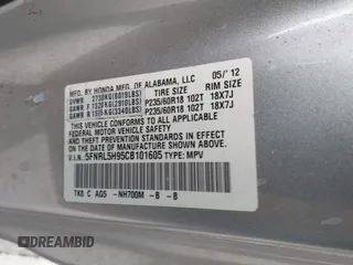 2012 Honda Odyssey Touring with VIN 5FNRL5H95CB101605, listed as a IAAI auction lot 42025163 with 286,421 mi miles. Bid and sale history available at carsss.com. Image 9.