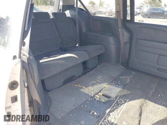 2006 Honda Odyssey LX with VIN 5FNRL38226B085181, listed as a IAAI auction lot 42594621 with 210,616 mi miles and . Bid and sale history available at DreamBid. Image 8.