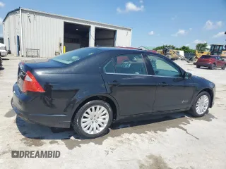 2010 Ford Fusion Hybrid z VIN 3FADP0L36AR176691, wystawiony jako Copart lot #61957685 z przebiegiem 105 452 mil mil oraz Czysty tytuł • Clean title. Historia ofert i sprzedaży dostępna na DreamBid. Obrazek 3.