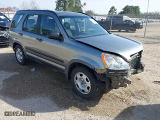 2006 Honda CR-V LX with VIN JHLRD68586C024863, listed as a IAAI auction lot 41569505 with 210,624 mi miles. Bid and sale history available at carsss.com. Image 1.