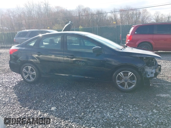 2018 Ford Focus SE z VIN 1FADP3FE9JL255818, wystawiony jako IAAI lot #42009017 z przebiegiem 79 329 mil mil oraz . Historia ofert i sprzedaży dostępna na DreamBid. Obrazek 14.