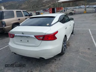 2016 Nissan Maxima SR with VIN 1N4AA6AP4GC449440, listed as a IAAI auction lot 41756271 with 136,685 mi miles and . Bid and sale history available at DreamBid. Image 4.