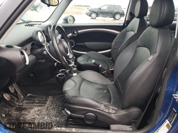 2007 MINI Hardtop S with VIN WMWMF735X7TT80244, listed as a Copart auction lot 46060635 with 116,032 mi miles and Salvage Title. Bid and sale history available at DreamBid. Image 7.