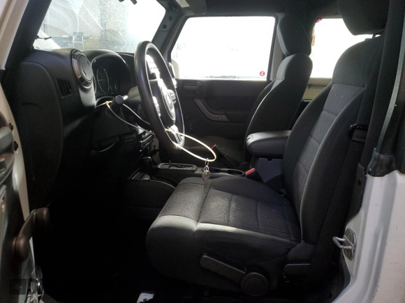 2011 Jeep Wrangler Sport with VIN 1J4AA2D12BL555530, listed as a Copart auction lot 42049915 with 83,349 mi miles and Salvage Title. Bid and sale history available at carsss.com. Image 7.