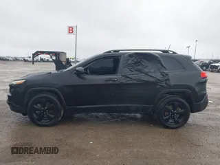 2017 Jeep Cherokee Sport with VIN 1C4PJMAB7HW614572, listed as a IAAI auction lot 41477399 with 117,288 mi miles and . Bid and sale history available at DreamBid. Image 14.
