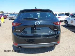 2020 Mazda CX-5 Sport with VIN JM3KFABM2L0761184, listed as a IAAI auction lot 41847768 with 47,582 mi miles. Bid and sale history available at carsss.com. Image 16.