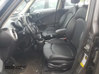 2011 MINI Countryman S z VIN WMWZC5C56BWL53827, wystawiony jako Copart lot #58953505 z przebiegiem Nie podano mil oraz Szkody całkowita. Historia ofert i sprzedaży dostępna na DreamBid. Obrazek 7.