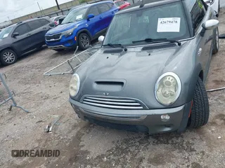 2006 MINI Convertible S with VIN WMWRH33586TF87791, listed as a IAAI auction lot 42679478 with 90,209 mi miles and . Bid and sale history available at DreamBid. Image 6.