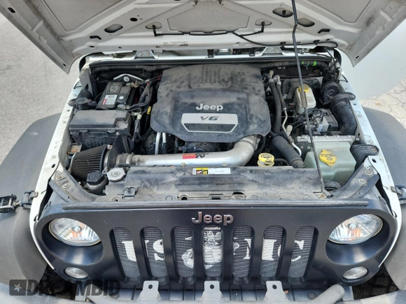 2016 Jeep Wrangler Black Bear with VIN 1C4AJWAG5GL151537, listed as a Copart auction lot 62665455 with 93,537 mi miles and Salvage title. Bid and sale history available at DreamBid. Image 12.