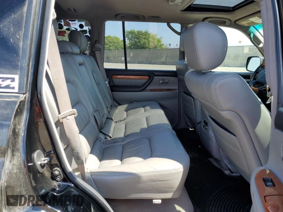 2006 Lexus LX 470 z VIN JTJHT00W264004516, wystawiony jako Copart lot #72607504 z przebiegiem 220 156 mil mil oraz Czysty tytuł • Clean title. Historia ofert i sprzedaży dostępna na DreamBid. Obrazek 11.