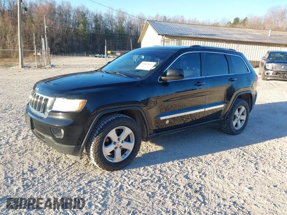 2012 Jeep Grand Cherokee Laredo with VIN 1C4RJFAG3CC246577, listed as a IAAI auction lot 41807693 with 164,574 mi miles. Bid and sale history available at carsss.com. Image 17.